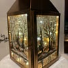 A hand painted and fired metal and glass lantern by Andrew Jenkins 
