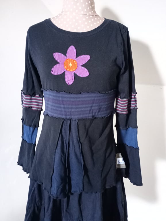 Patchwork top with long sleeves and flower applique