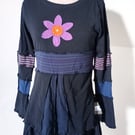 Patchwork top with long sleeves and flower applique