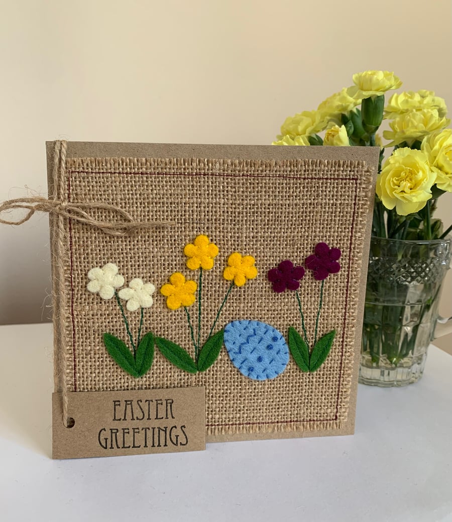 Easter greeting card with flowers and decorated egg. Handmade. Wool felt.