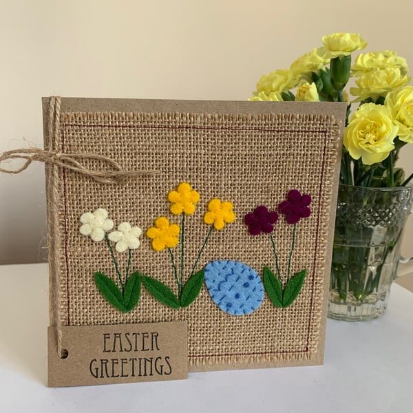 Easter greeting card with flowers and decorated egg. Handmade. Wool felt.