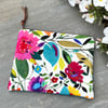 Bright floral linen zip pouch with velvety back and leopard print lining
