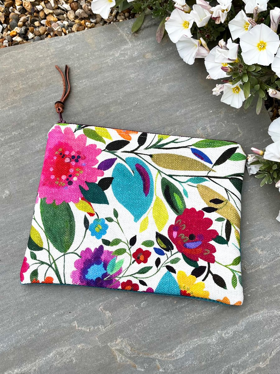 Bright floral linen zip pouch with velvety back and leopard print lining