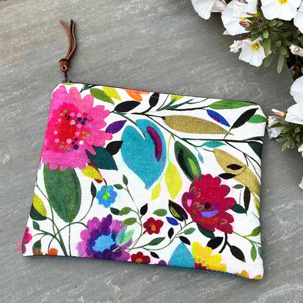 Bright floral linen zip pouch with velvety back and leopard print lining