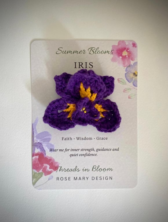 Crocheted Iris brooch on meaning card