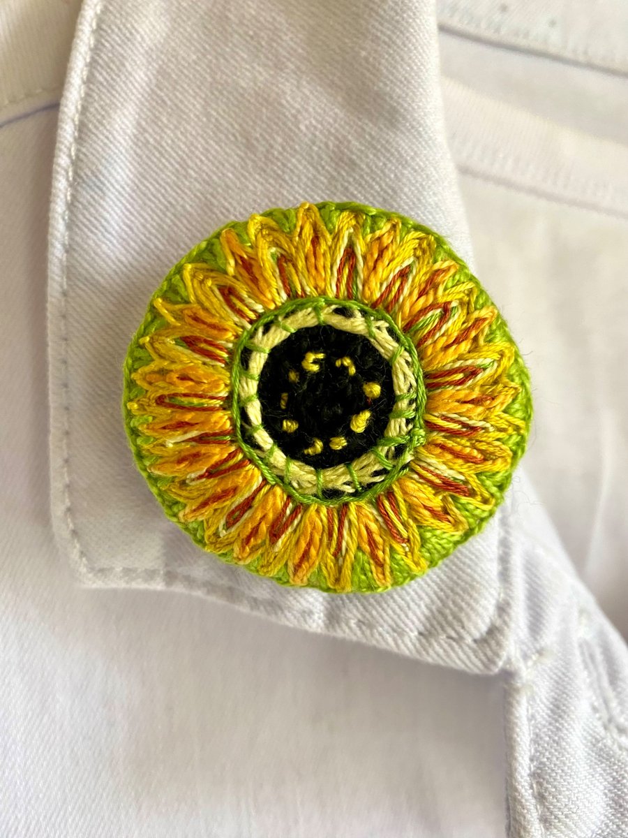 Radiant sunflower brooch