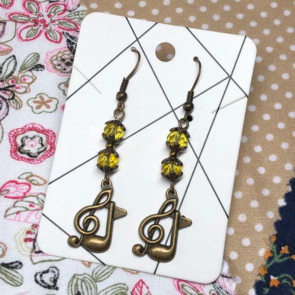 Yellow crystal music charm earrings