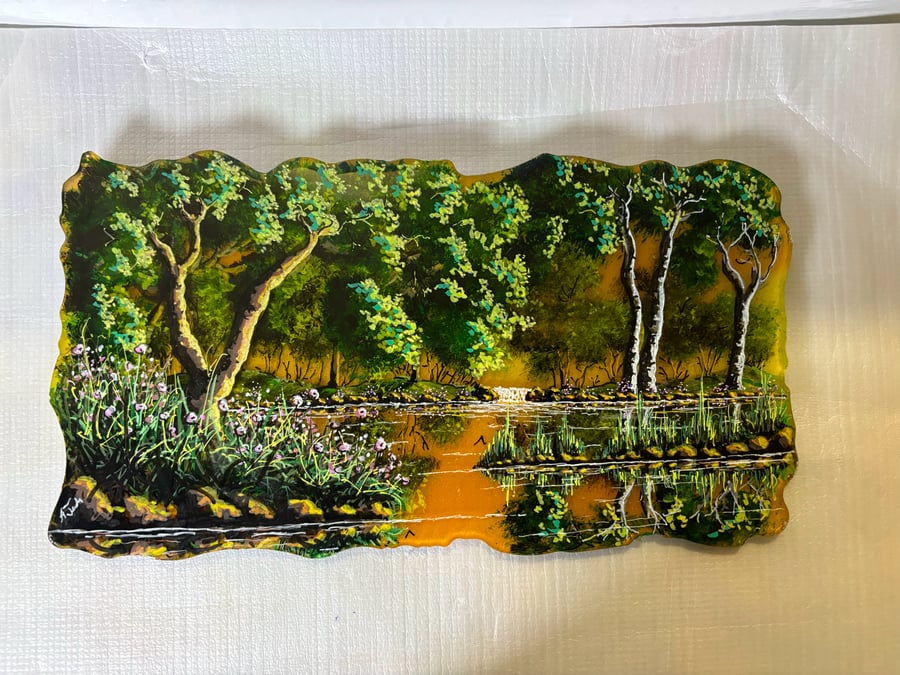 A hand paint and resin layered scene by Andrew Jenkins 