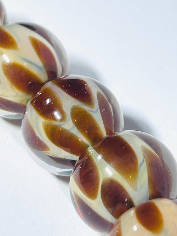 Handmade brown and beige lamp work glass beads