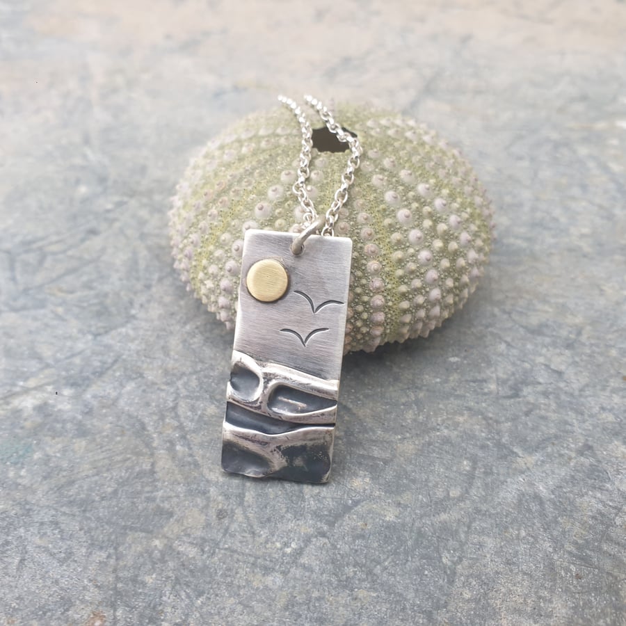 Silver beach, sea coast pendant, with brass sun and seagulls