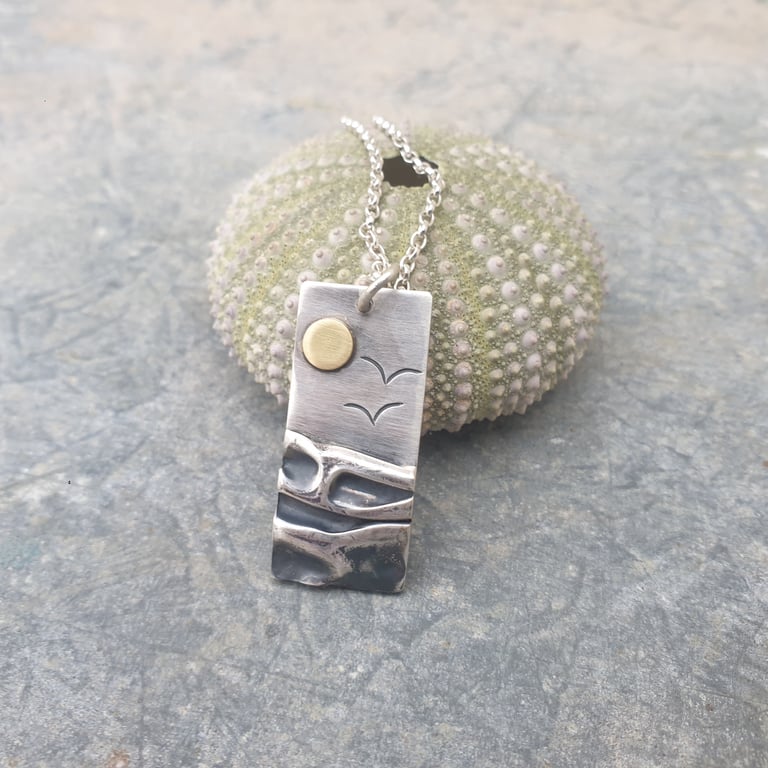 Silver beach, sea coast pendant, with brass sun and seagulls