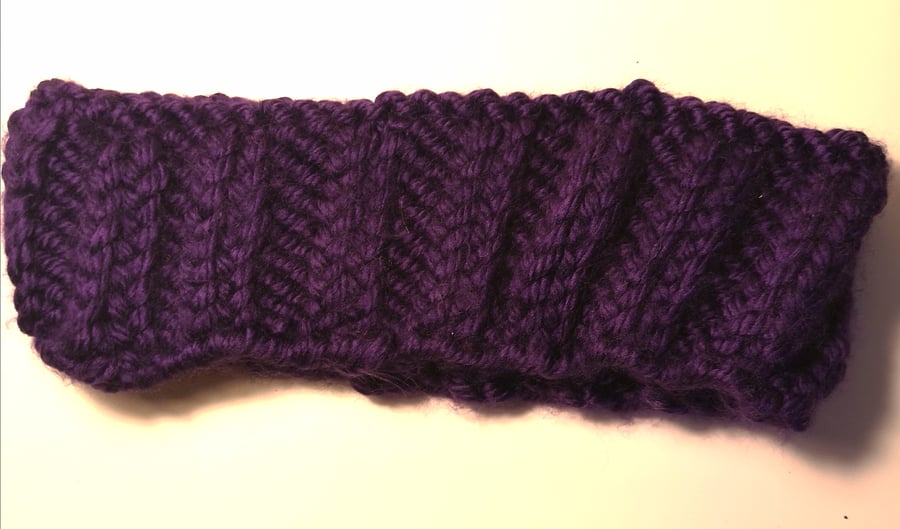 Handknitted purple ribbed ear warmer