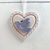 Small pottery heart with lilac bird