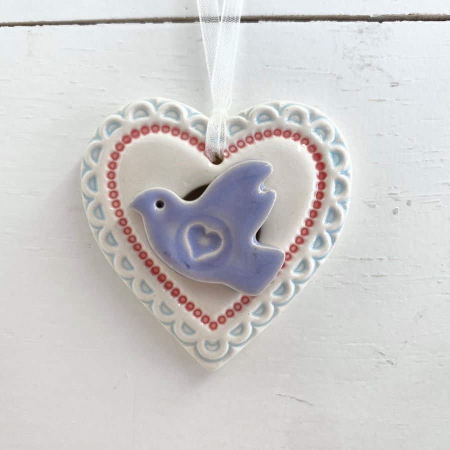 Small pottery heart with lilac bird