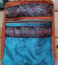 Rust and teal bag