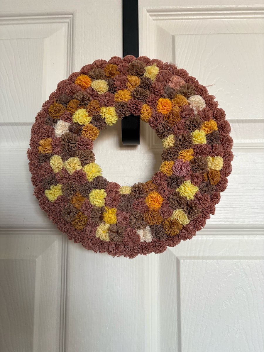 Chocolate and cream and yellow scrunchy Pom Pom wood wreath. 