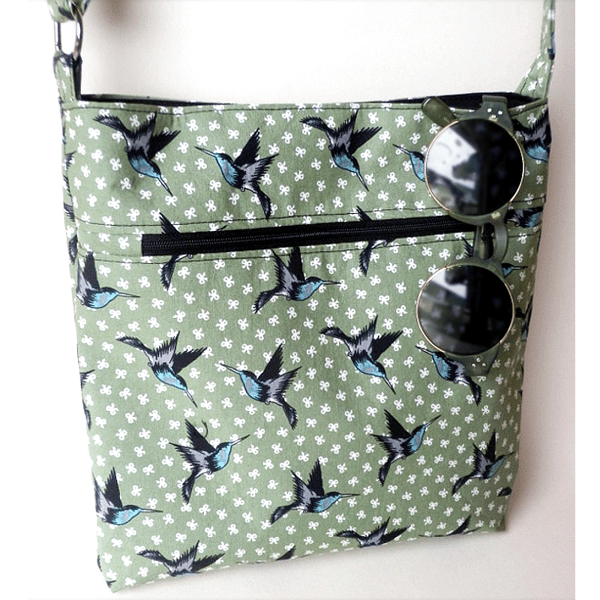 Gorgeous sage green crossbody bag with swallows and bows