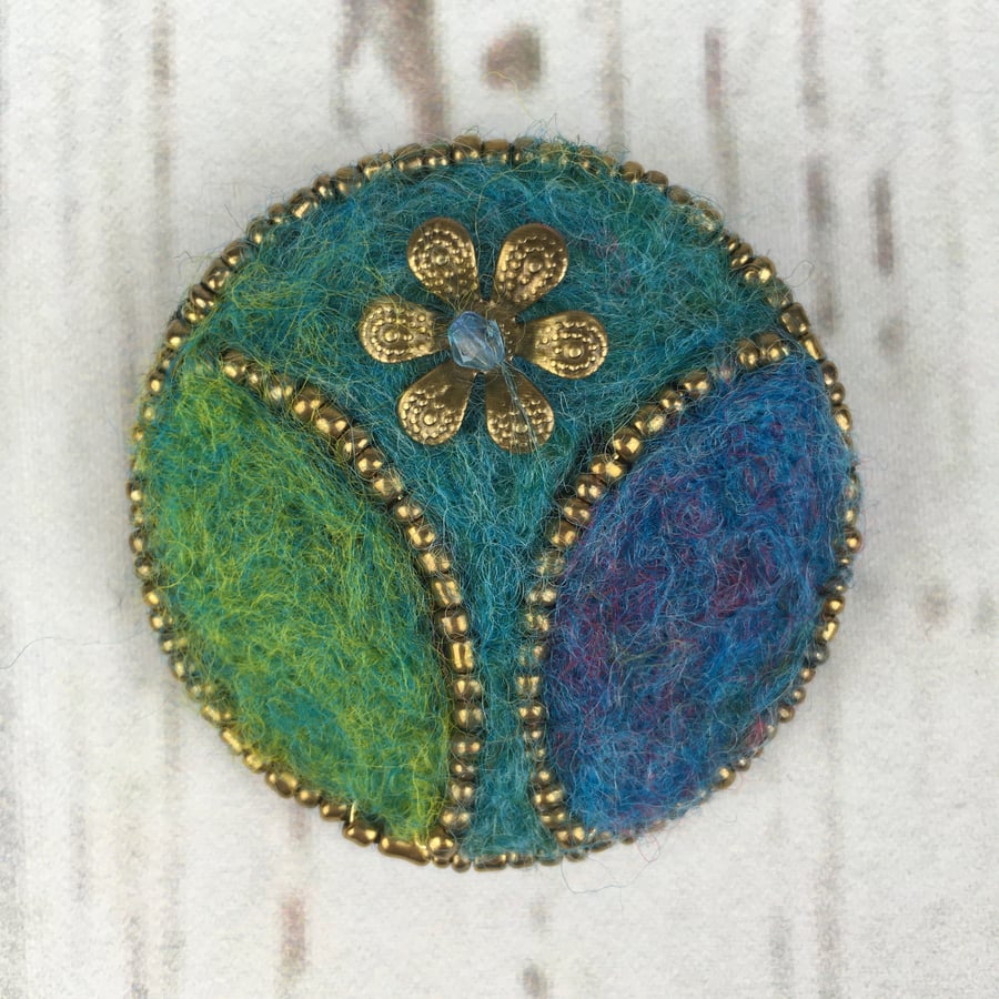 Needle felted, beaded floral brooch, green-blue