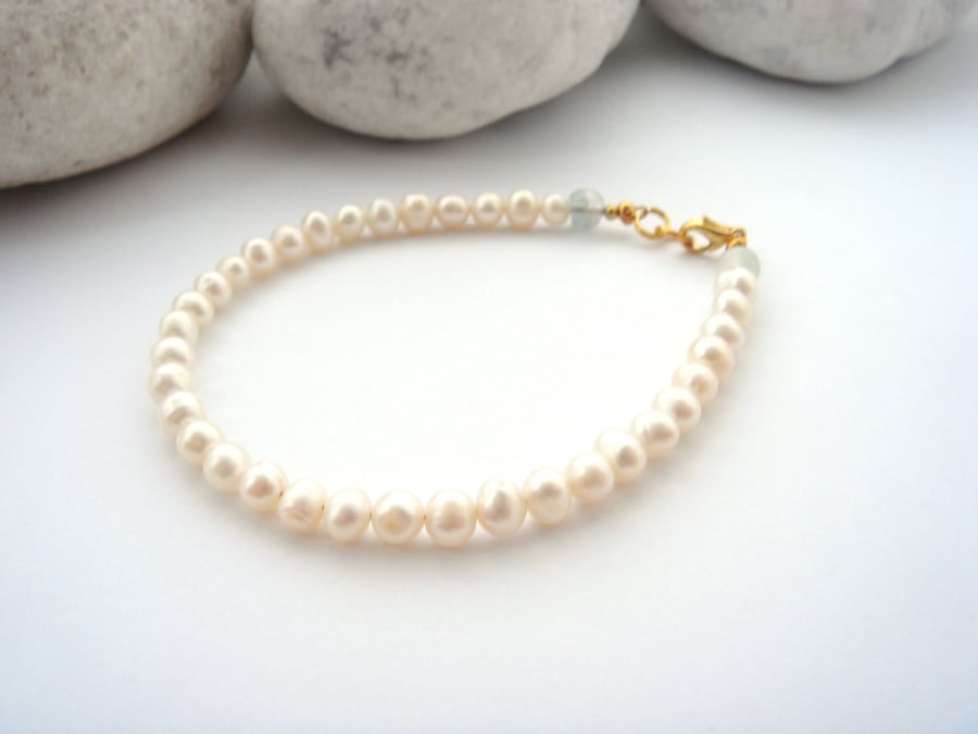 Ivory Freshwater pearl Bracelet with pale green accent