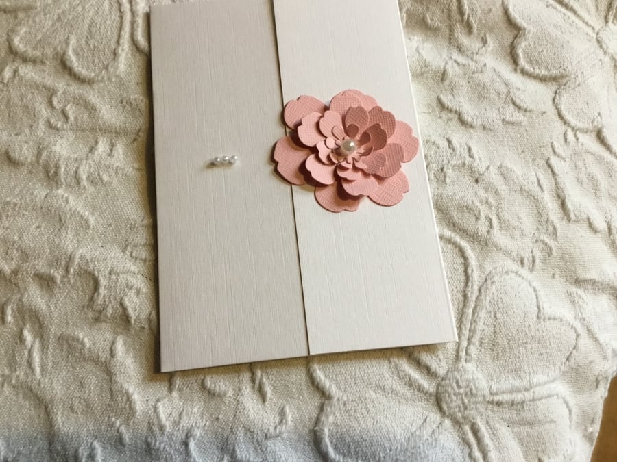 Pretty blank card topped with a hand made flower