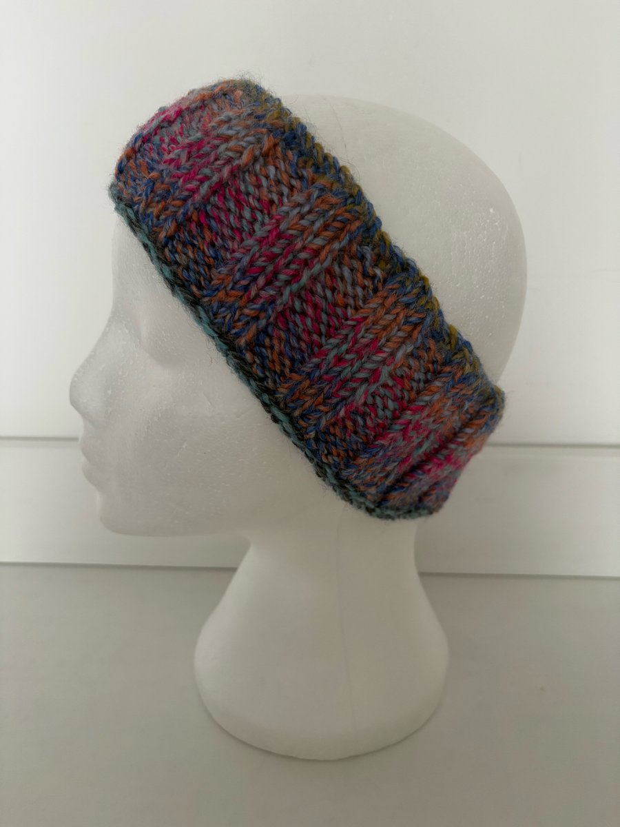 Hand knitted headband. 