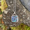 Silver square pendant set with abalone, heart cutout on back 18inch chain