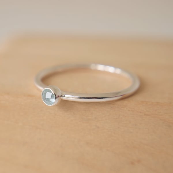 Blue Topaz and Silver Ring. March Birthstone