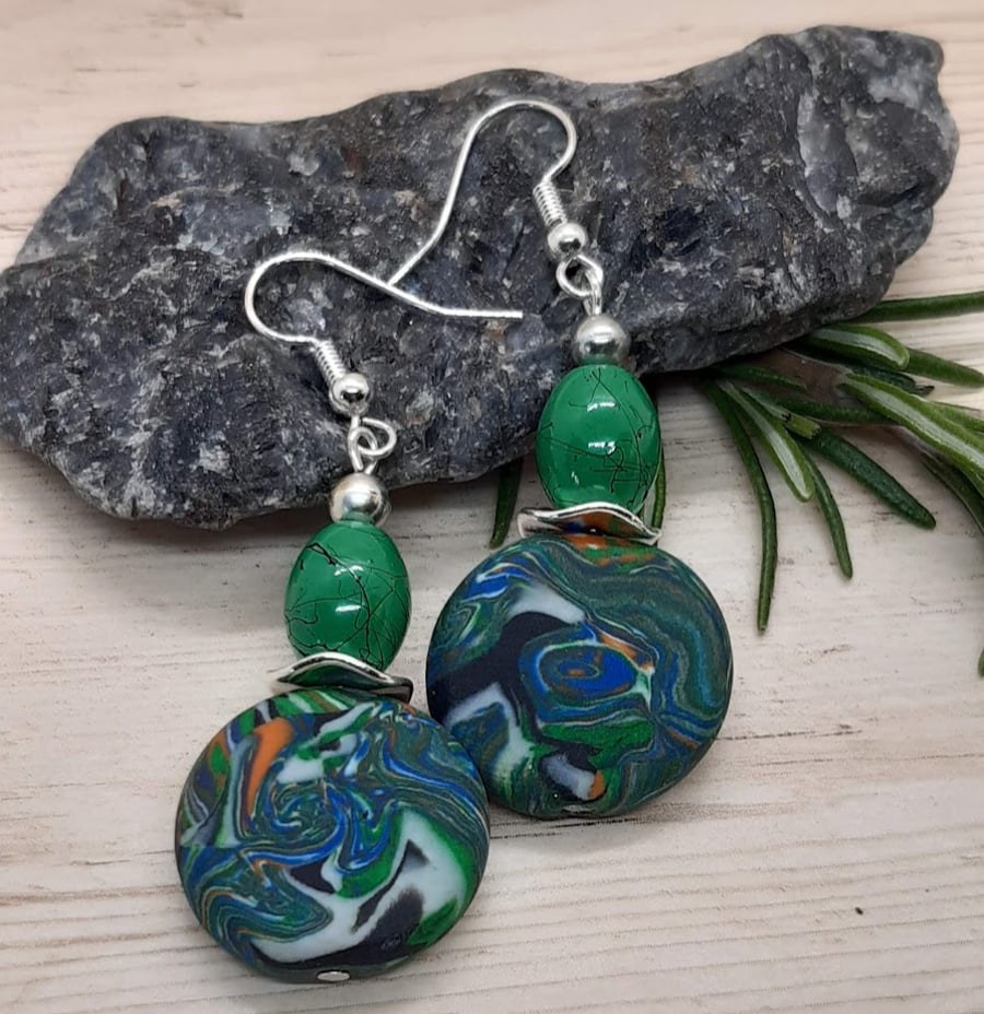 Green multi-coloured dangly earrings