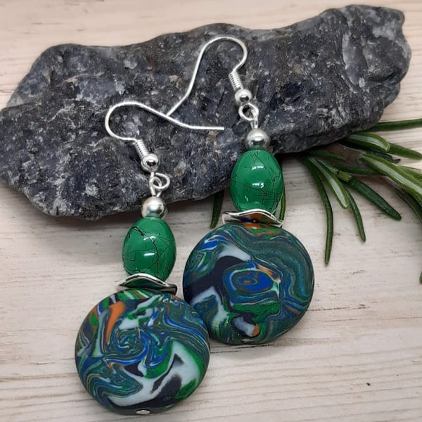 Green multi-coloured dangly earrings