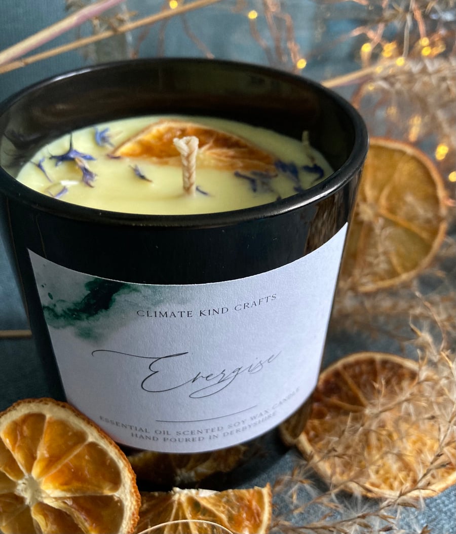 Vegan soy candle, zesty energising fragrance, with dried orange and flowers