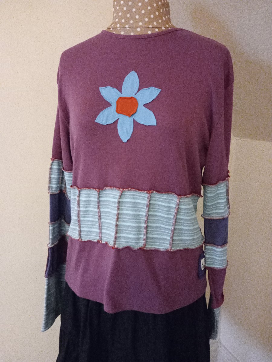 Patchwork top with long sleeves and flower applique