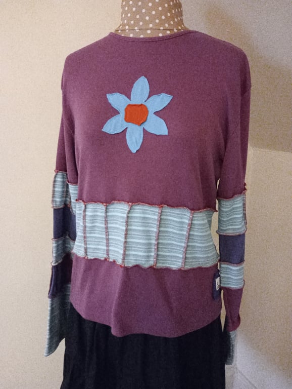 Patchwork top with long sleeves and flower applique