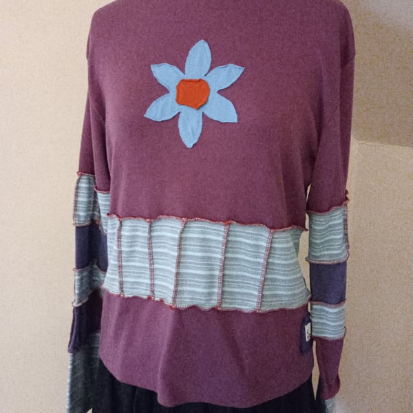 Patchwork top with long sleeves and flower applique