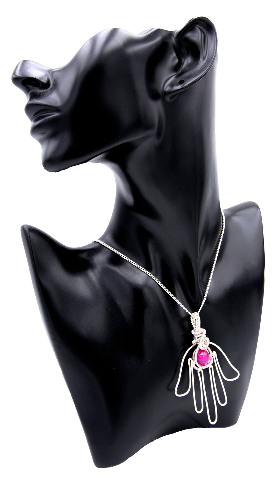 Hamsa hand pendant; wire wrapped pink semi precious stone; symbolism; colours of