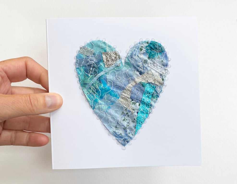 Up-cycled handmade fabric embroidered heart art card. 