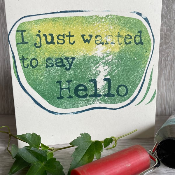 Hello handprinted greeting card in green linocut design