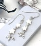 Mother of Pearl and sterling silver stars dropper earrings
