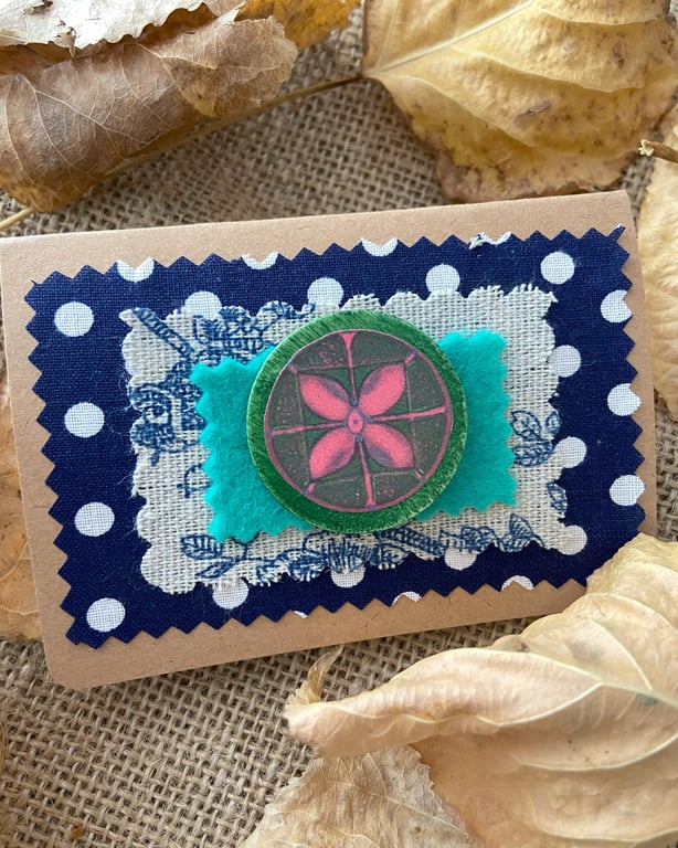 Handcrafted brooch with four leaf petal in red and green