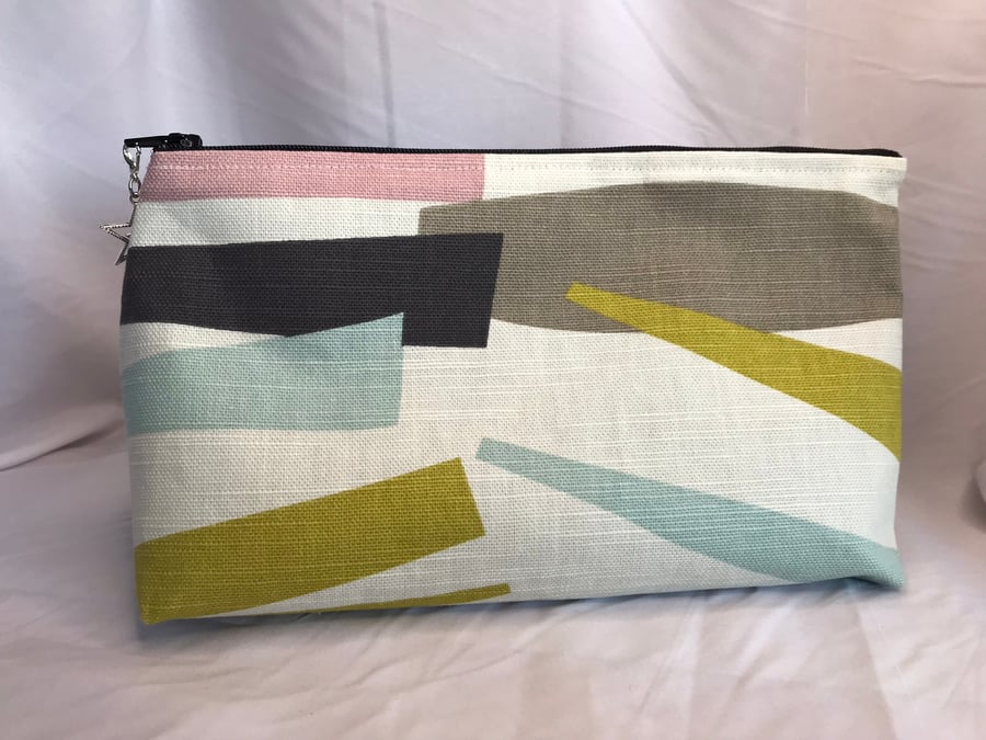 Handmade fabric toiletry bags, make up bags, with a zipper closer.