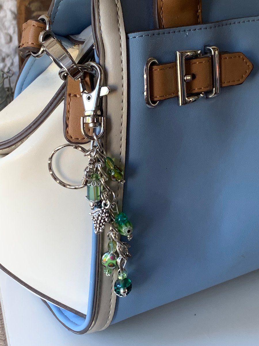 Handmade Handbag charm letting with green glass beads