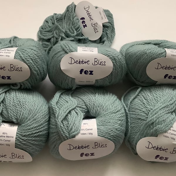 DEBBIE BLISS  yarn. ' Fez'. Merino wool, camel . Aran. Blue.. 300g total.