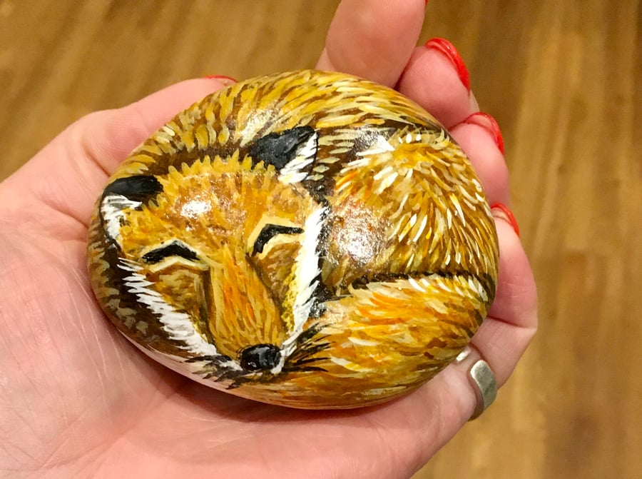 Had painted pebble fox sleeping portrait garden rock art stone