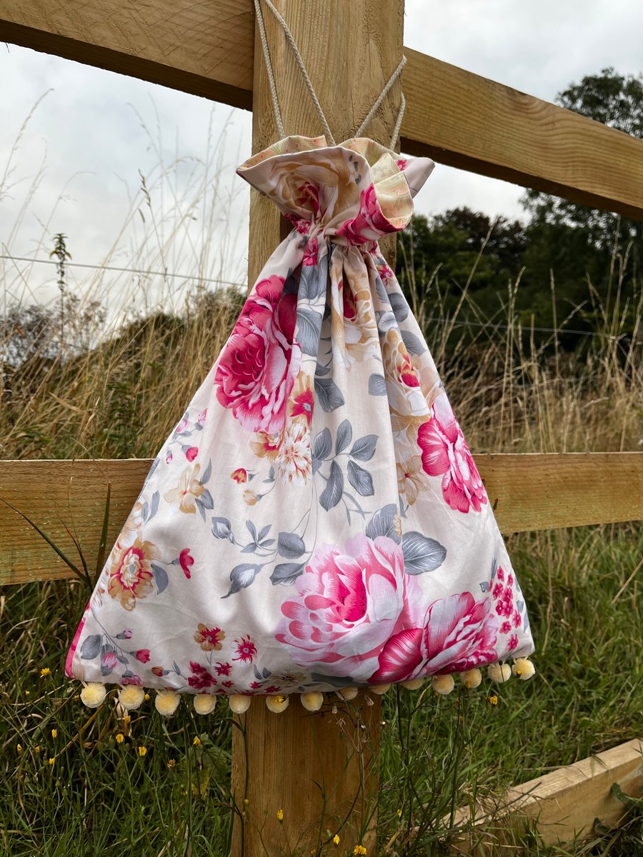 Pretty roses drawstring bag with pompoms and paisley cotton lining