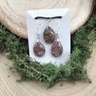 Dried pressed heather flowers set in clear resin set