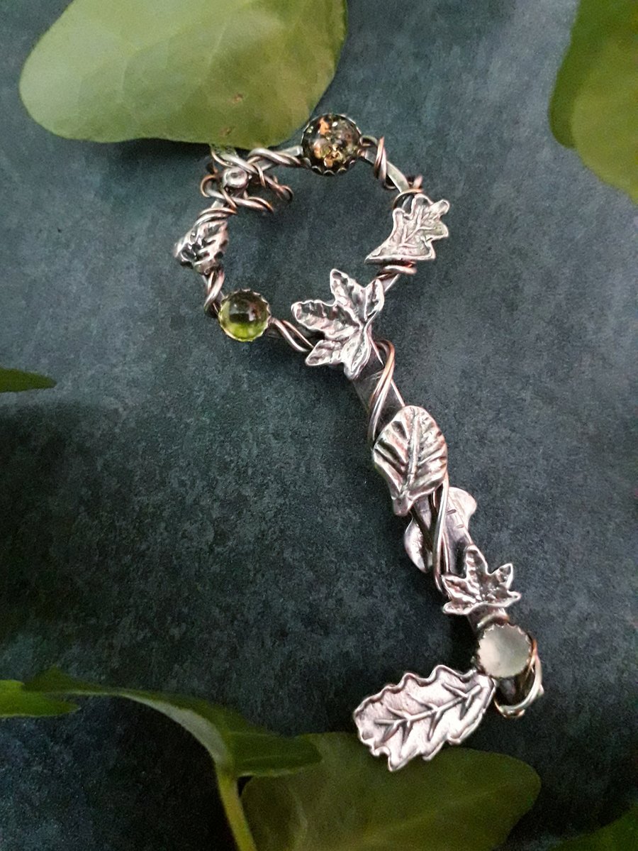 Key to Nature - handmade Silver Pendant with leaves and green gemstones