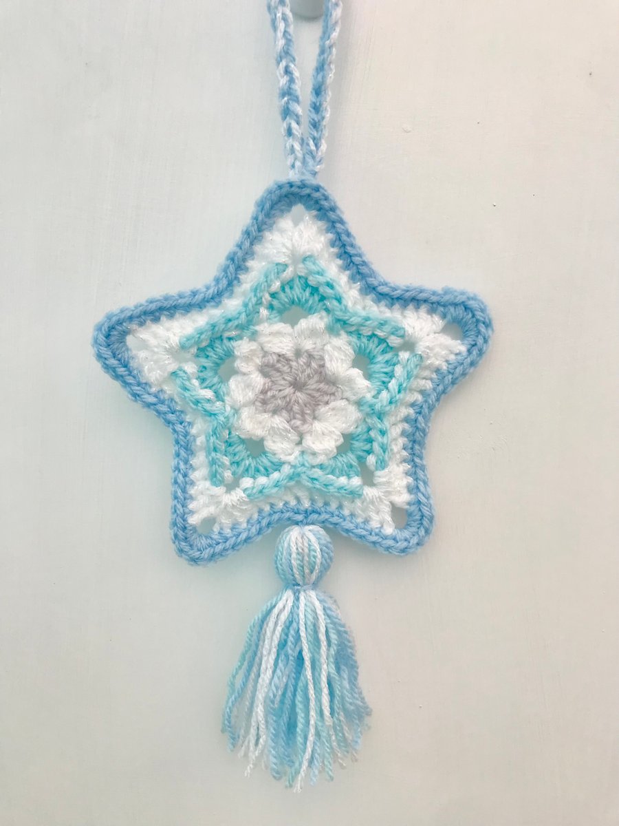 Winter Christmas star crochet hanging decoration with tassel