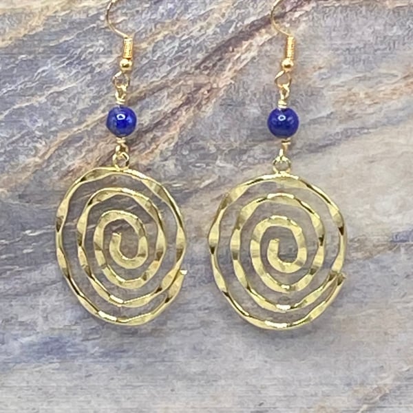 Gold tone spiral charm earrings with lapis lazuli stones