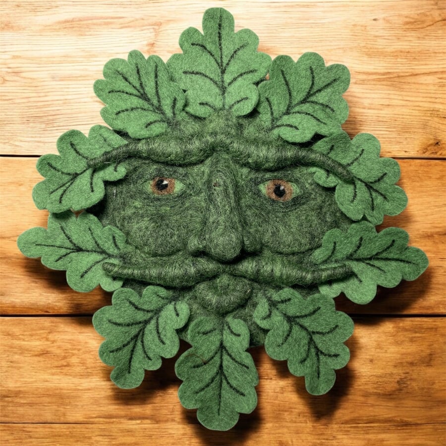 Green man woollen sculpture with oak leaves, wall hanging