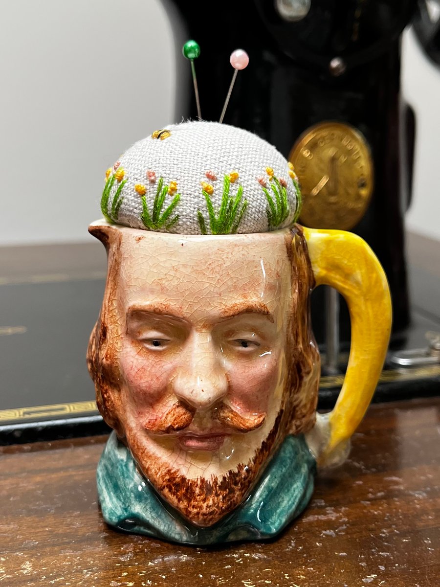 Pin cushion in Shakespeare vintage Toby jug embroidered flowers and bee