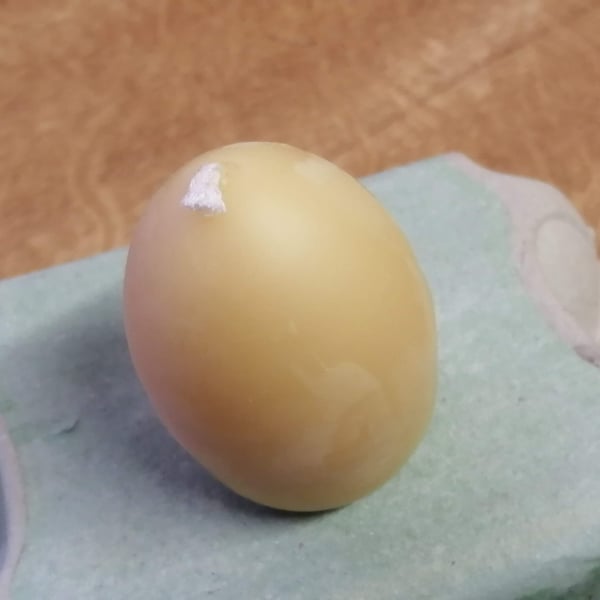 Beeswax egg shaped candle handmade using organic beeswax